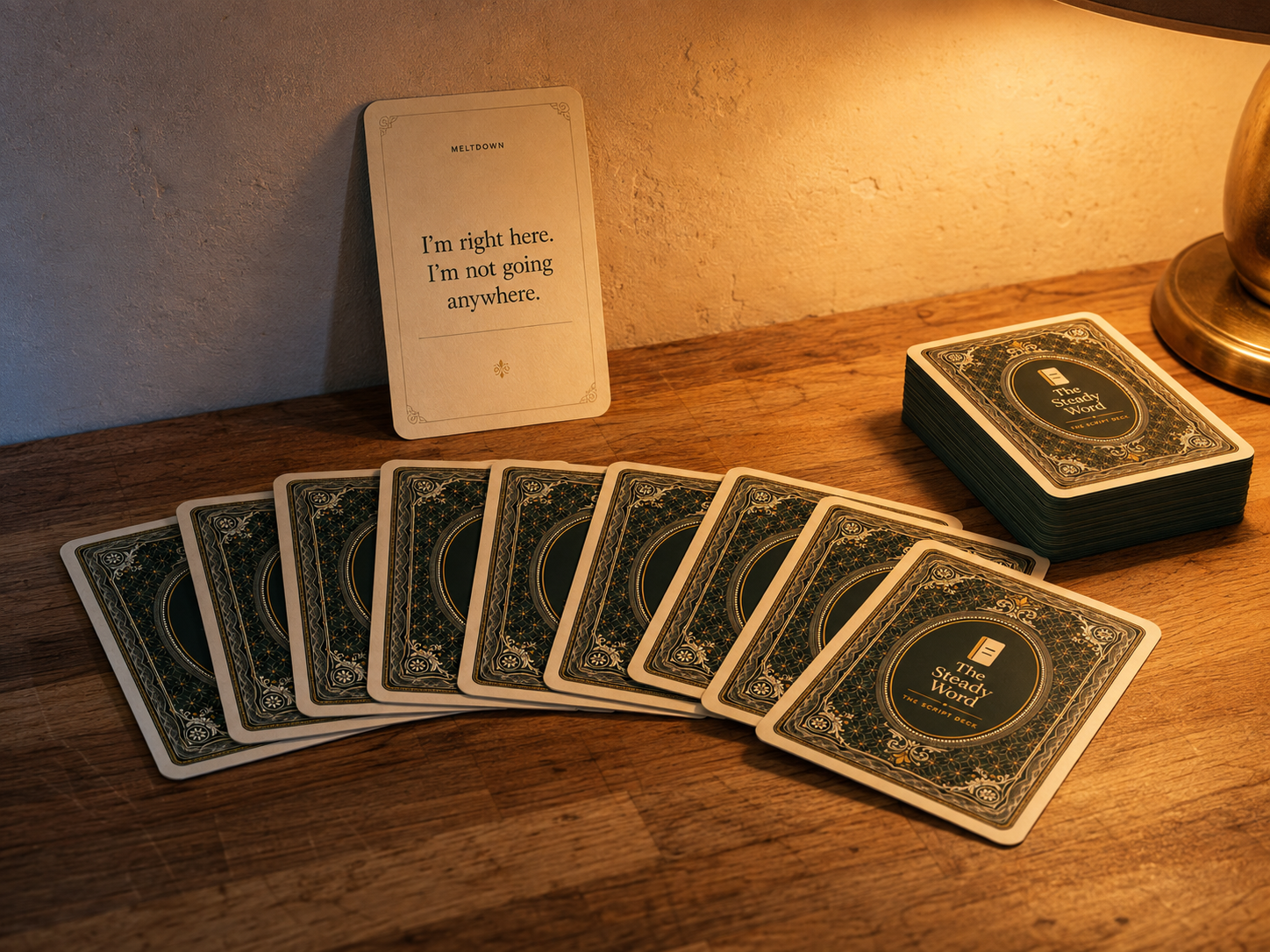 The Meltdown Deck card beside a phone showing the same script